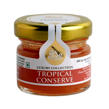 A jar of KA Gourmet Tropical Conserve with a gold-colored lid and a label that reads 'Luxury Collection Tropical Conserve'.